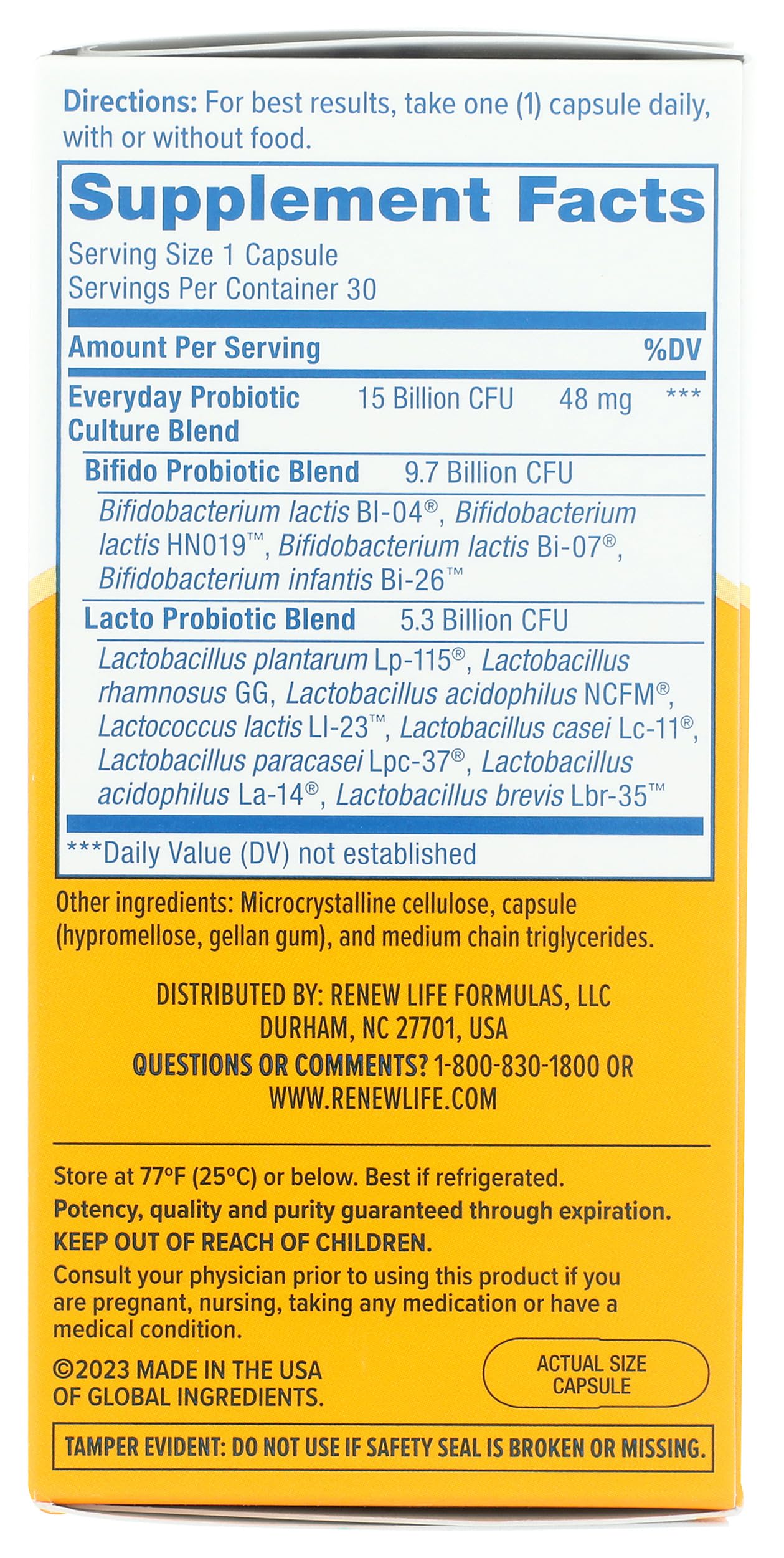 Renew Life Probiotic Capsules displayed on a wooden surface