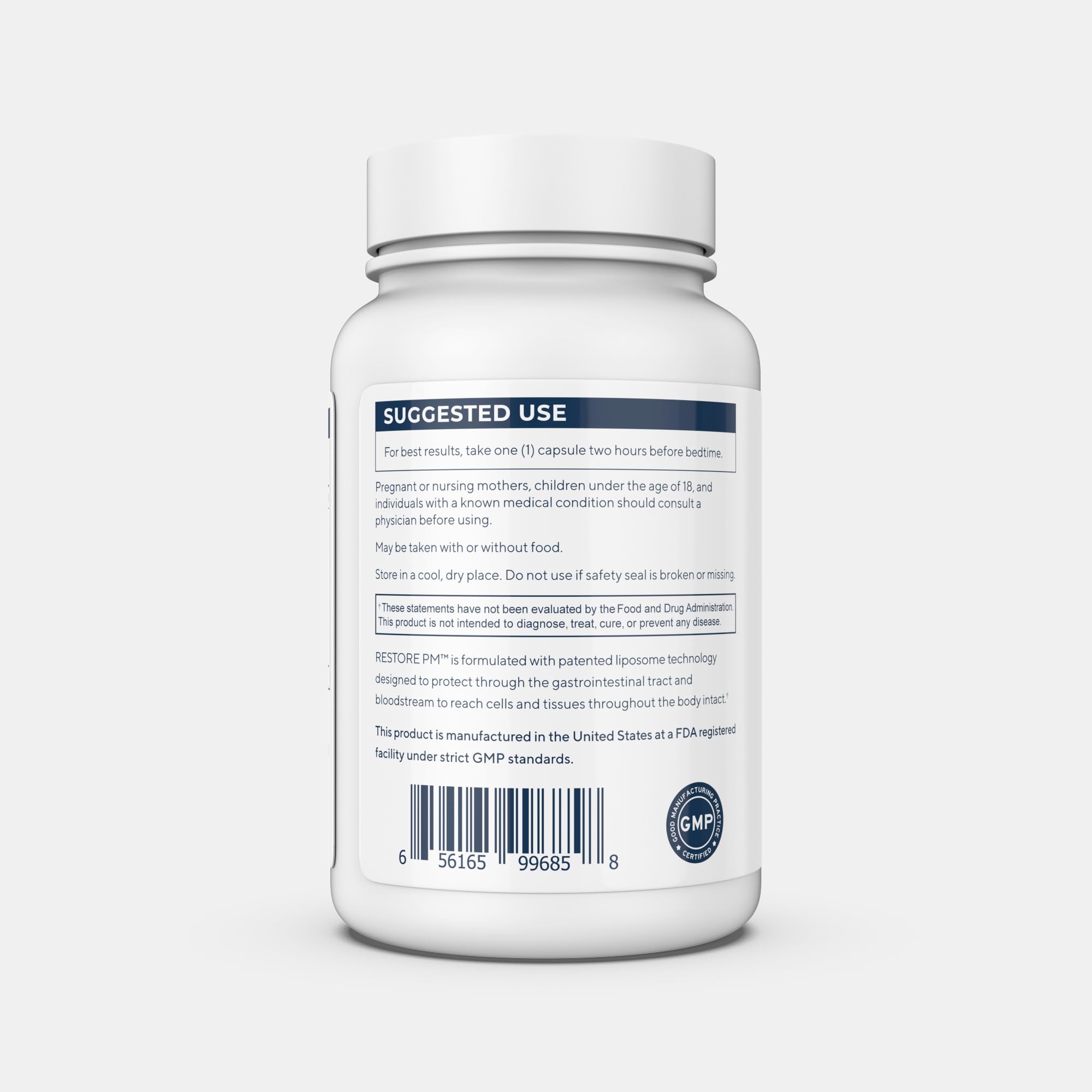 Renue By Science Restore PM capsules on a wooden surface