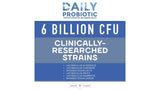 Replenish the Good Probiotic Supplement capsules in hand