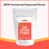 Revitalize Wellness Kid's Defense Powder mixed in a glass of water