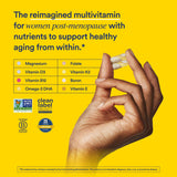 Ritual Essential for Women Multivitamin 50+ capsules on a wooden surface