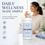 Ritual Labs Happy Supplement capsules on a wooden table