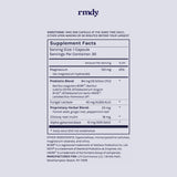 rmdy Probiotic Capsules with a glass of water