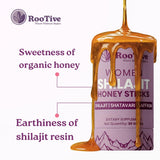 ROOTIVE Shilajit Honey Stick being held in hand