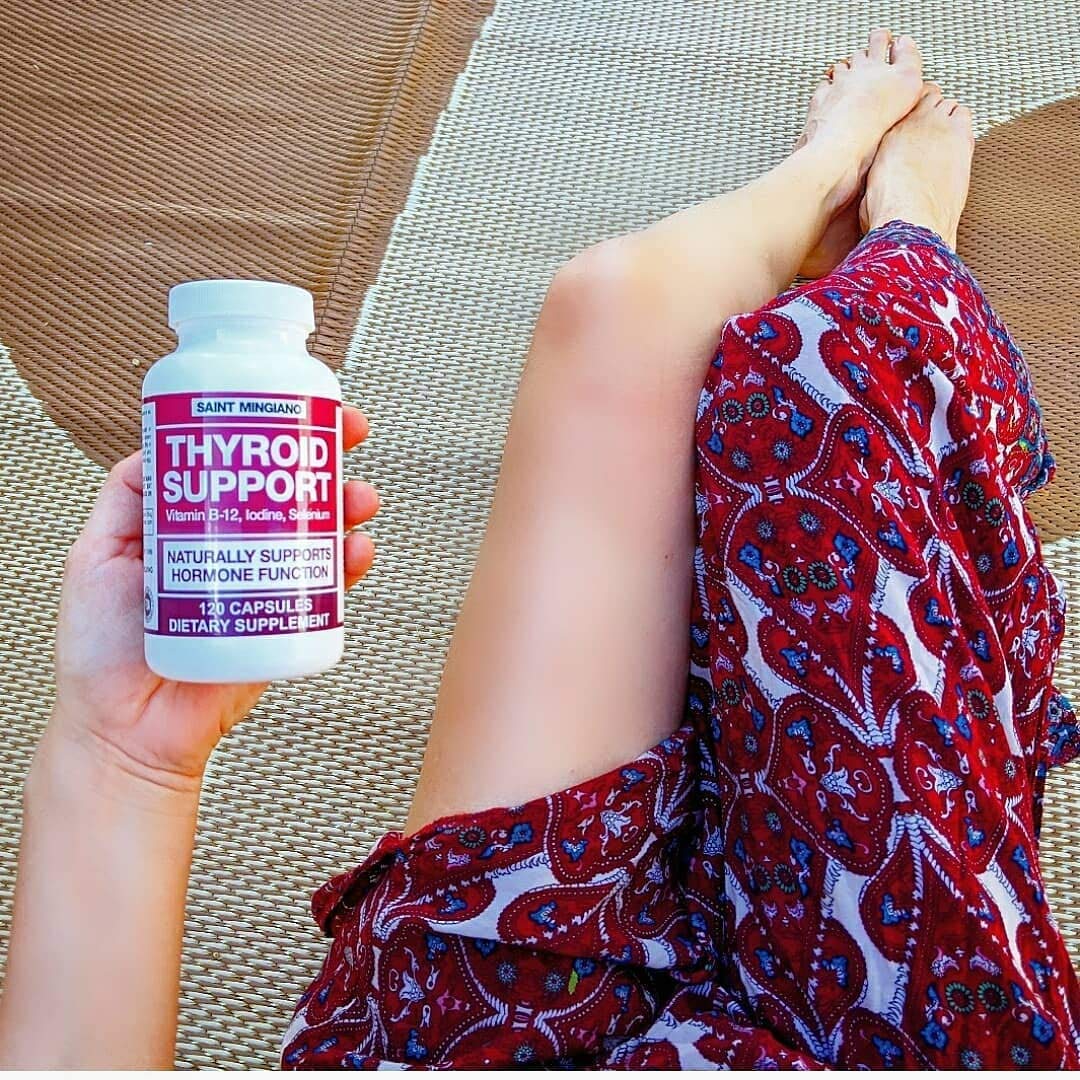 Saint Mingiano Thyroid Support Supplement with a measuring spoon