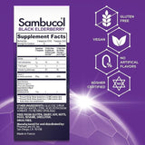 Sambucol Black Elderberry Syrup with a spoon