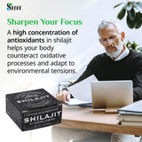 Sayan Shilajit Resin 40g next to a glass of water