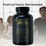 Schizandu Activated Coconut Charcoal Capsules on a wooden table