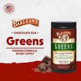 Scoop of Barlean's Chocolate Silk Greens in a glass of water