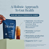 Scoop of Bio.me Daily Prebiotic Fiber powder on a table