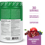 Scoop of BIOSTEEL Sport Greens powder on a wooden surface