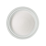 Scoop of Calcium Lactate Gluconate Powder on a kitchen counter