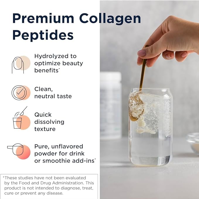 Scoop of Designs for Health Collagen Powder on a wooden spoon