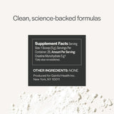 Scoop of Gainful Creatine Monohydrate Powder on a table