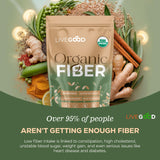 Scoop of LIVEGOOD Organic Fiber Powder on a wooden table