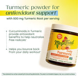 Scoop of MegaFood Turmeric Powder 500mg on a wooden table