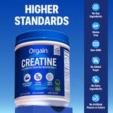 Scoop of Orgain Creatine Monohydrate Powder on a table
