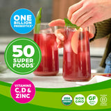 Scoop of Orgain Organic Superfoods + daily wellness Up! Powder