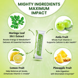 Scoop of Organic Veda Moringa Superfood Powder on a wooden spoon