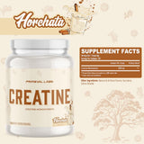 Scoop of Primeval Labs Flavored Creatine powder on a wooden table