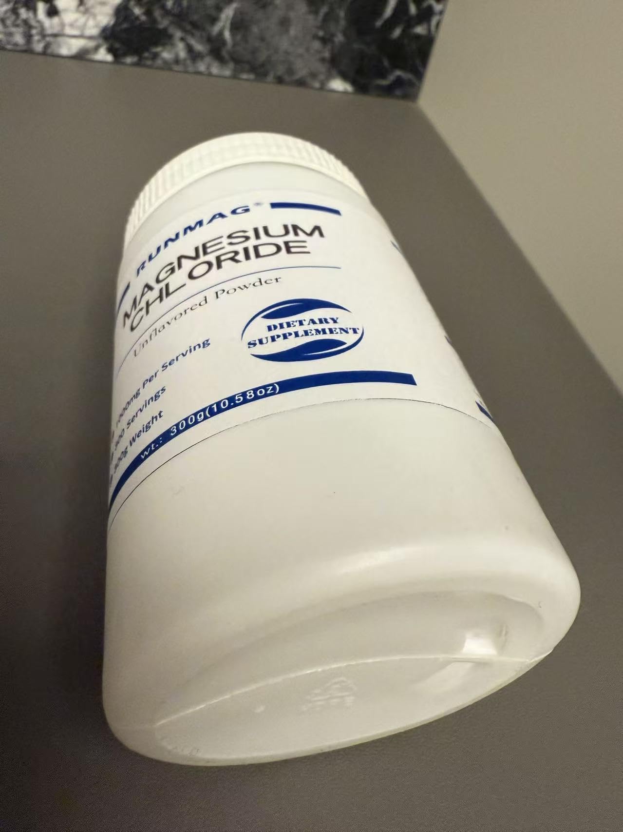 Scoop of RUNMAG Magnesium Chloride Powder