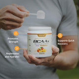 Scoop of Snap Supplements BCAAs Powder in water