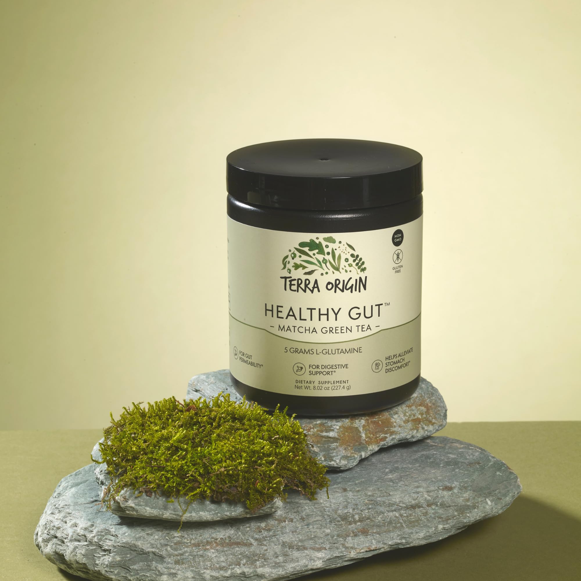 Scoop of TERRA ORIGIN Healthy Gut Powder 299g on a table