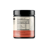 Scoop of TERRA ORIGIN Healthy Gut Powder on a wooden spoon