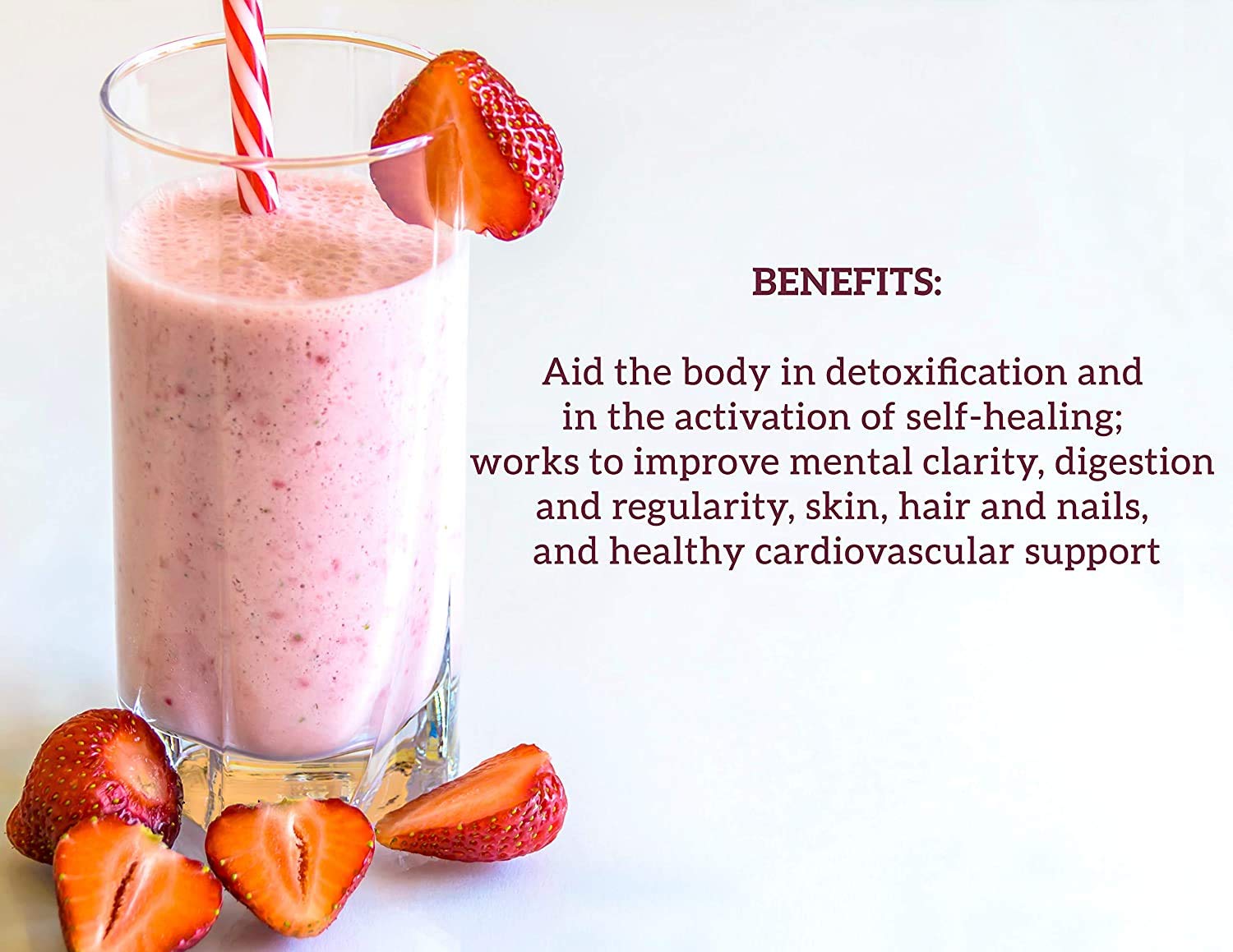 Scoop of THE HALLELUJAH DIET BarleyMax Berry Powder on a wooden spoon