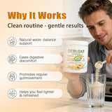 Scoop of TYDOTT Debloat Powder Peach Mango on a table