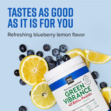 Scoop of Vibrant Health Green Vibrance powder with water