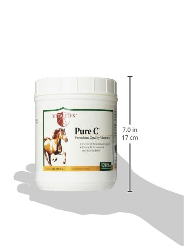 Scoop of Vita Flex Pure C Vitamin C powder on a table