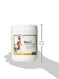 Scoop of Vita Flex Pure C Vitamin C powder on a table
