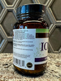 Script Essentials Iodine Complex capsules on wooden table