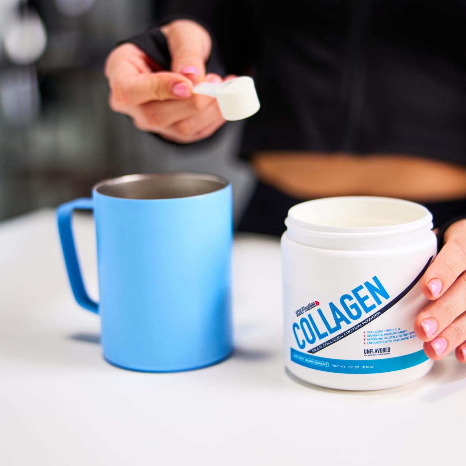 Sculpt Nation Collagen Powder scoop showing powder texture