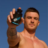 Sculpt Nation L-Arginine Supplement bottle with capsules spilled out