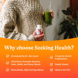 Seeking Health Molybdenum Glycinate Chelate supplement on a wooden table
