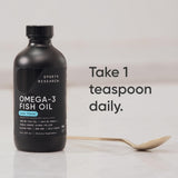 Serving suggestion of Sports Research Omega-3 Fish Oil Liquid on a spoon