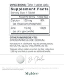 Shaklee Zinc tablets close-up on a wooden surface