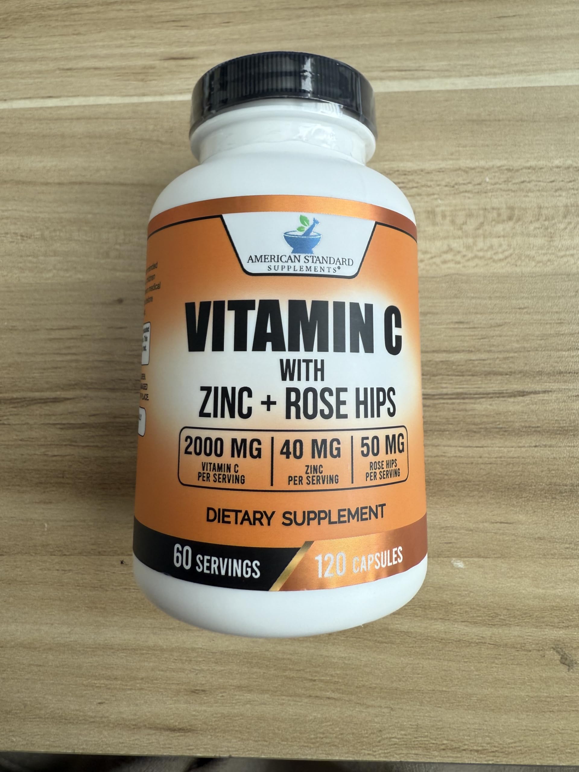Side view of American Standard Supplements Vitamin C with Zinc and Rose Hips capsule bottle