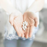 Silver Fern Probiotic Capsules 30 Count with a measuring spoon