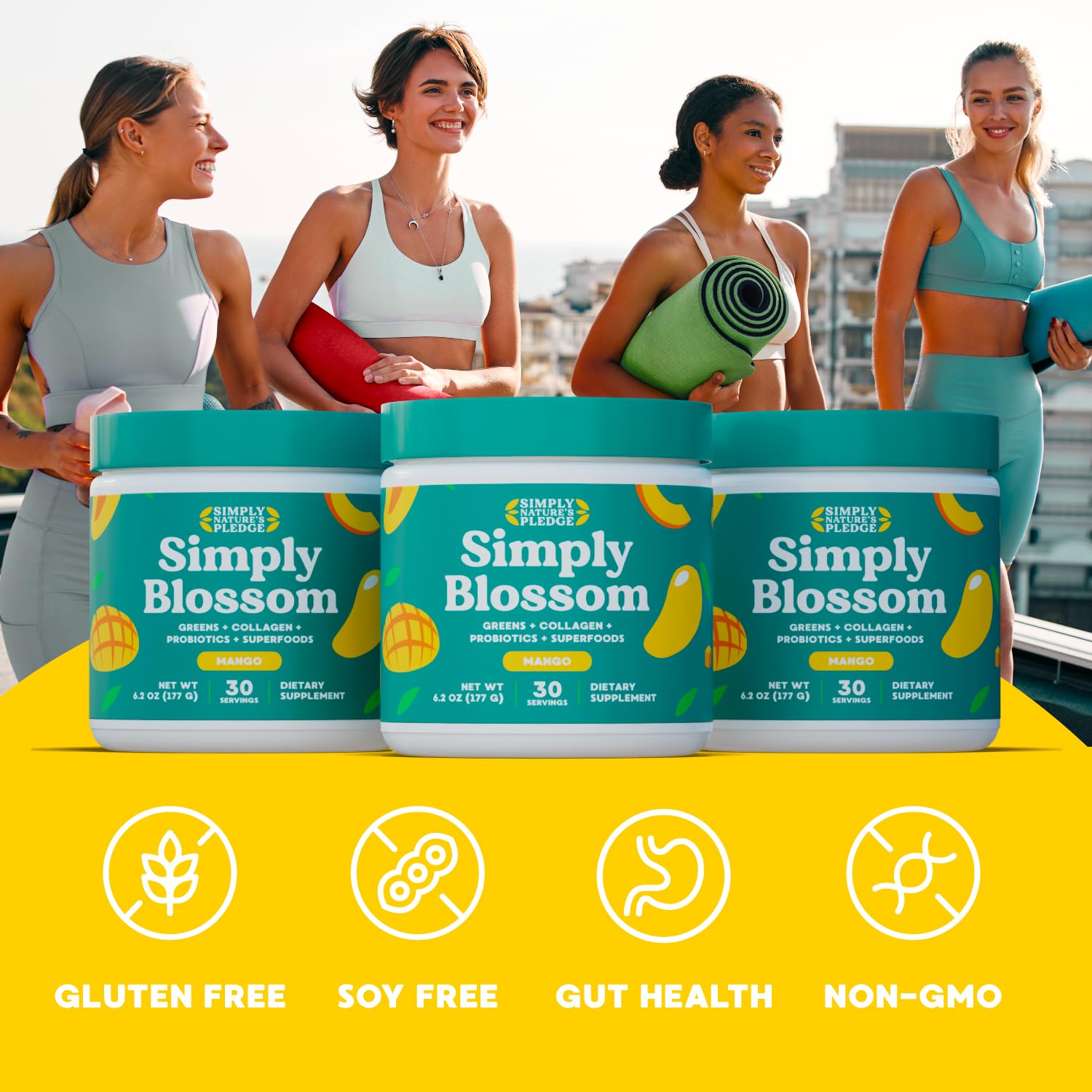 Simply Blossom Greens powder in a scoop with mango slices