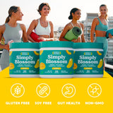Simply Blossom Greens powder in a scoop with mango slices