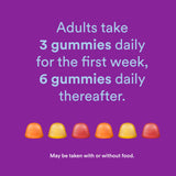 SmartyPants Adult Complete Multivitamin Gummies with a measuring spoon