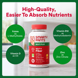 SmartyPants Adult Multi & Fiber Gummies with a measuring spoon