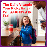 SmartyPants Kids Plus Multi & daily wellness gummy vitamins on a wooden table