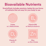 SmartyPants Women's Multi & Omega Gummies lifestyle scene with a glass of water