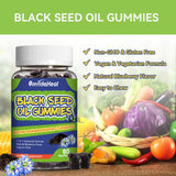 SmildeHeal Organic Black Seed Oil Gummies with a glass of water