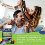 SmildeHeal Organic Black Seed Oil Gummies with a measuring spoon
