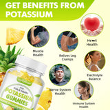softbear Potassium Gummies in a bowl with fresh pineapples